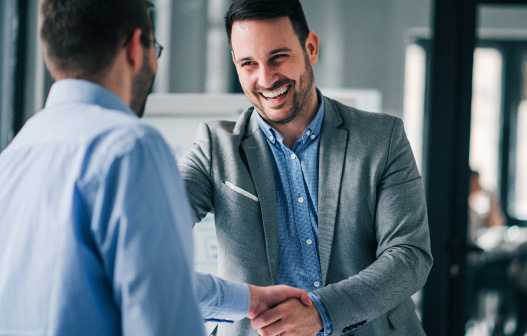 two men shaking hands